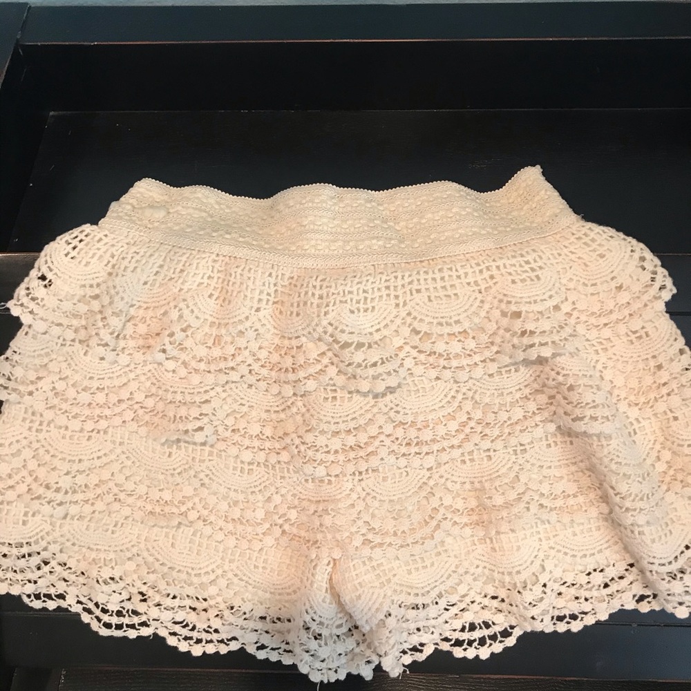 Cream color.  Knitted shorts. High waisted.